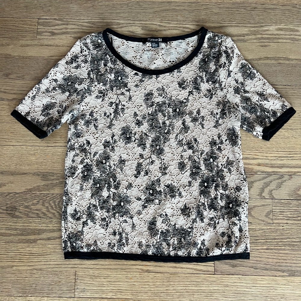 Forever 21 tan lace short sleeved too with black floral detail. Size M